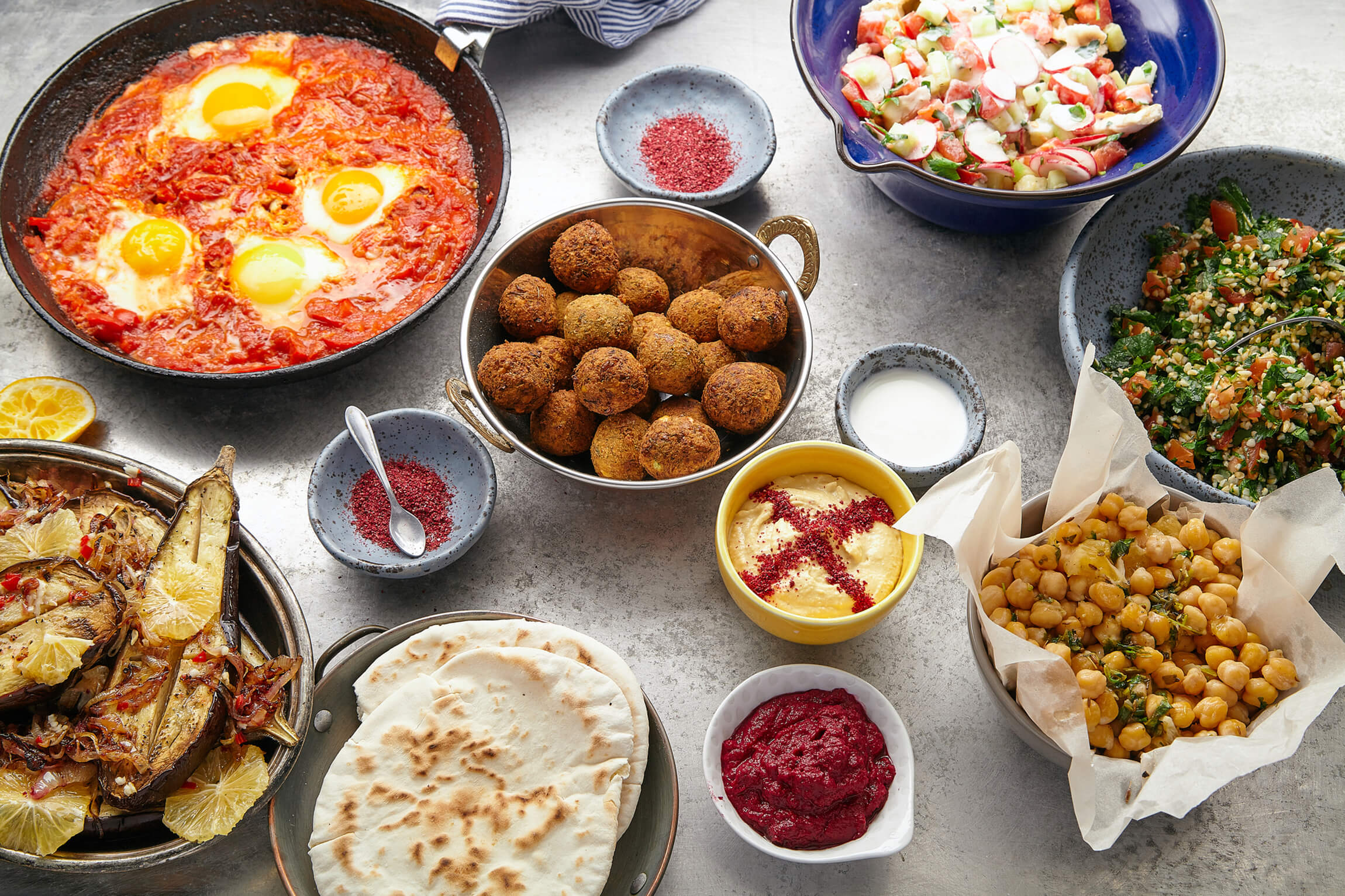 A spread of Middle Eastern food from Safta restaurant in Denver, Colorado.