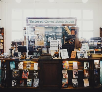 The checkout desk with many books on display at Tattered Cover Book Store in Denver, Colorado.