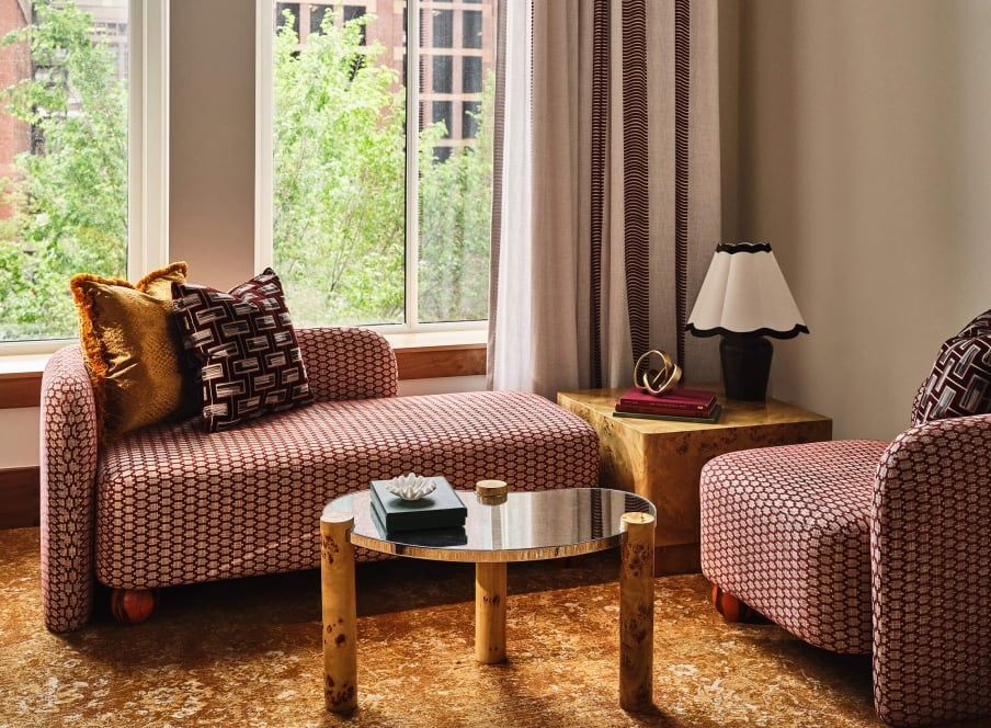 The seating area of the Premium Classic Guest Room at the Crawford Hotel in Denver, Colorado.