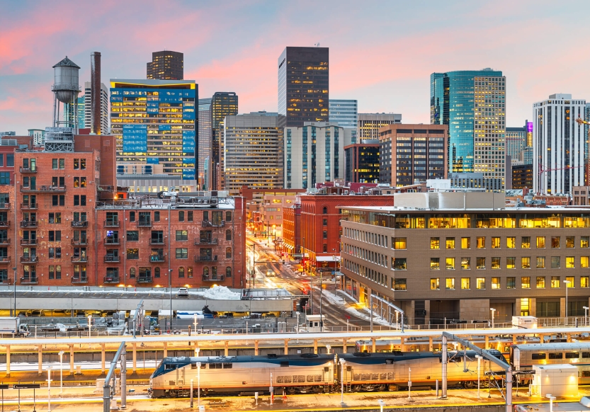 The Denver city skyline at sunset.