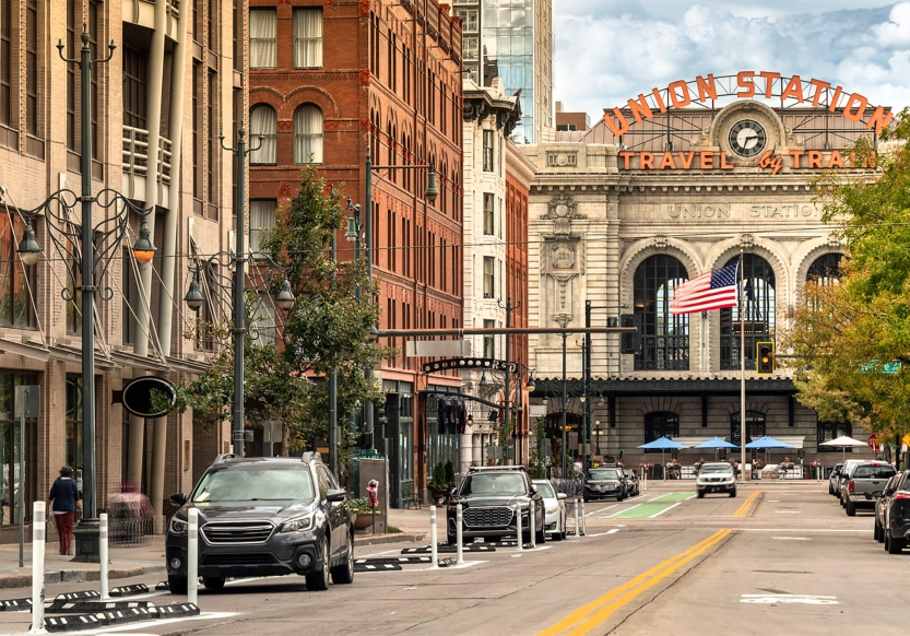 Looking down a street with historical buildings on either side. The Union Station is at the end of the street.